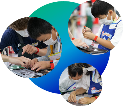 子どもたちがパソコンを組み立てる様子